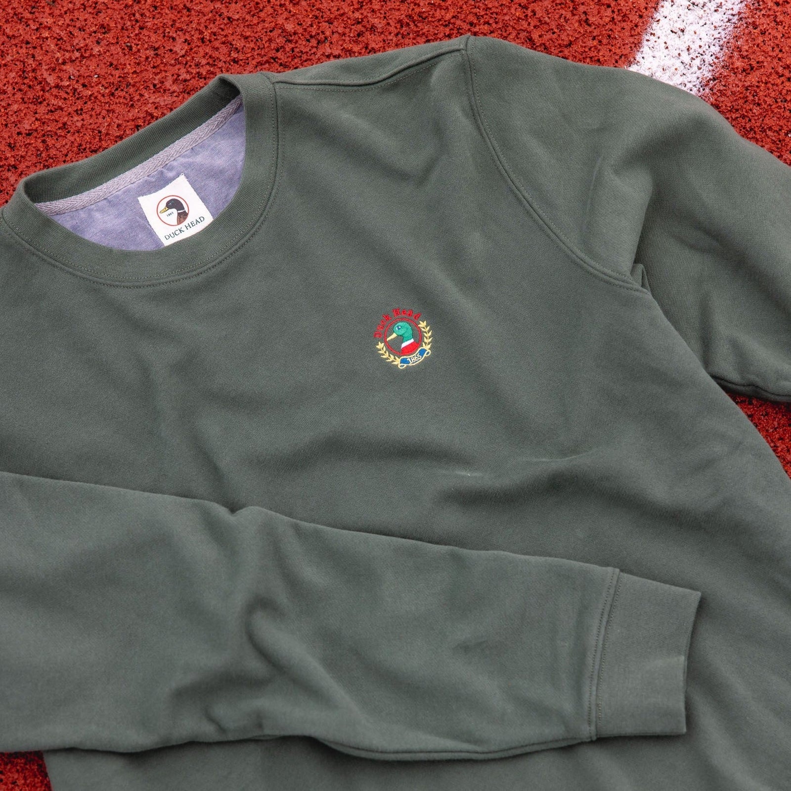 Embroidered Crest Crewneck Pullover::Shop Now &rarr;::/products/sweatshirt-with-duck-head-embroidery