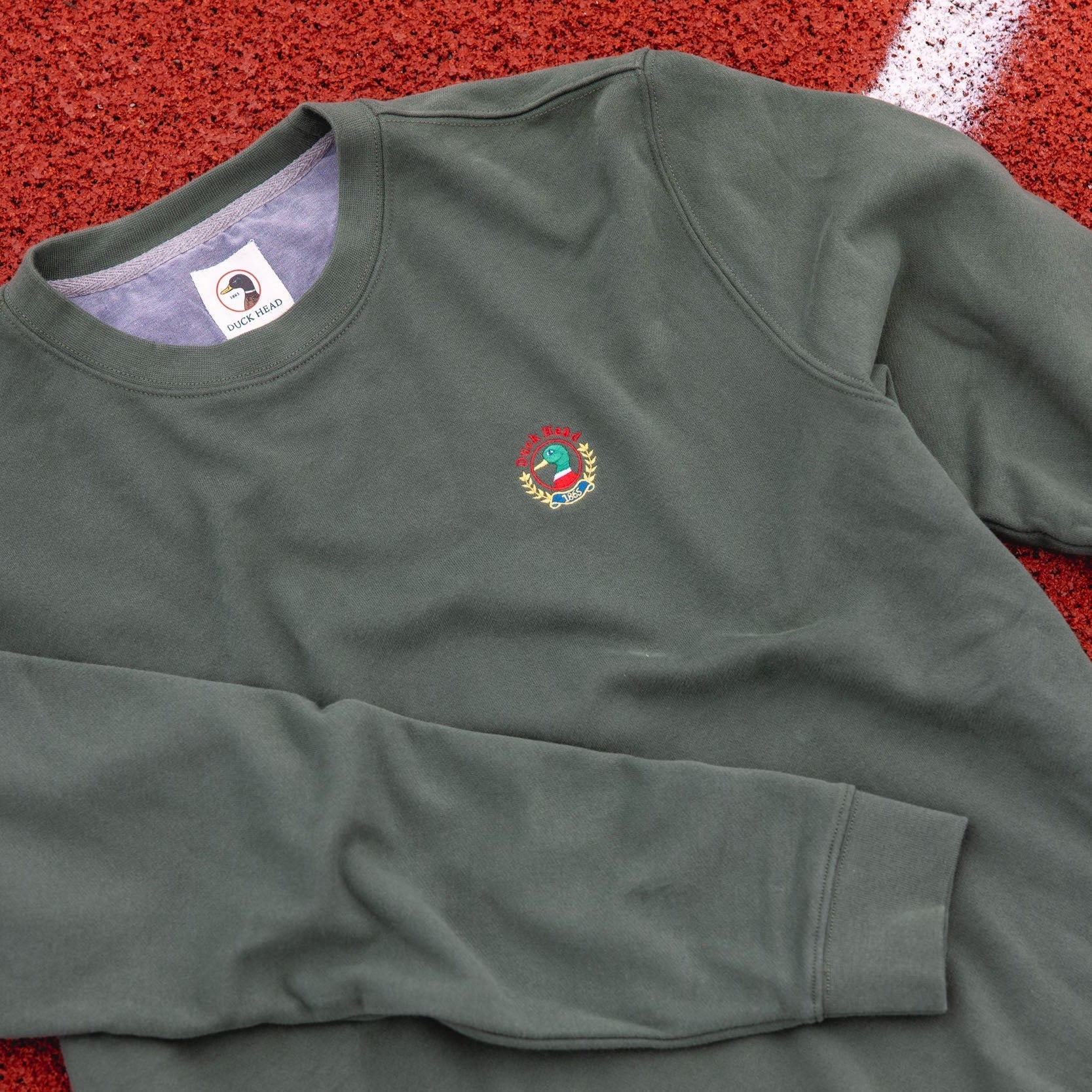 Embroidered Crest Crewneck Pullover::Shop Now &rarr;::/products/sweatshirt-with-duck-head-embroidery